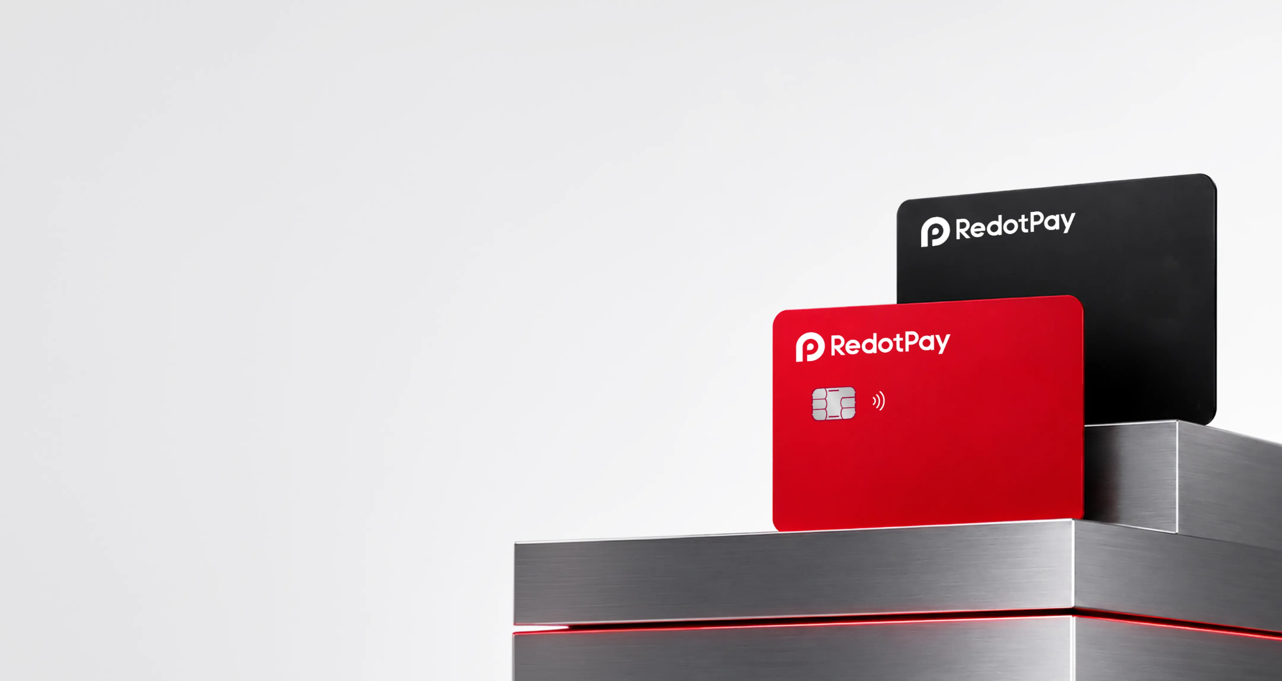 RedotPay 공식 사진의 빨간 실물카드와 검은 가상카드 디자인
